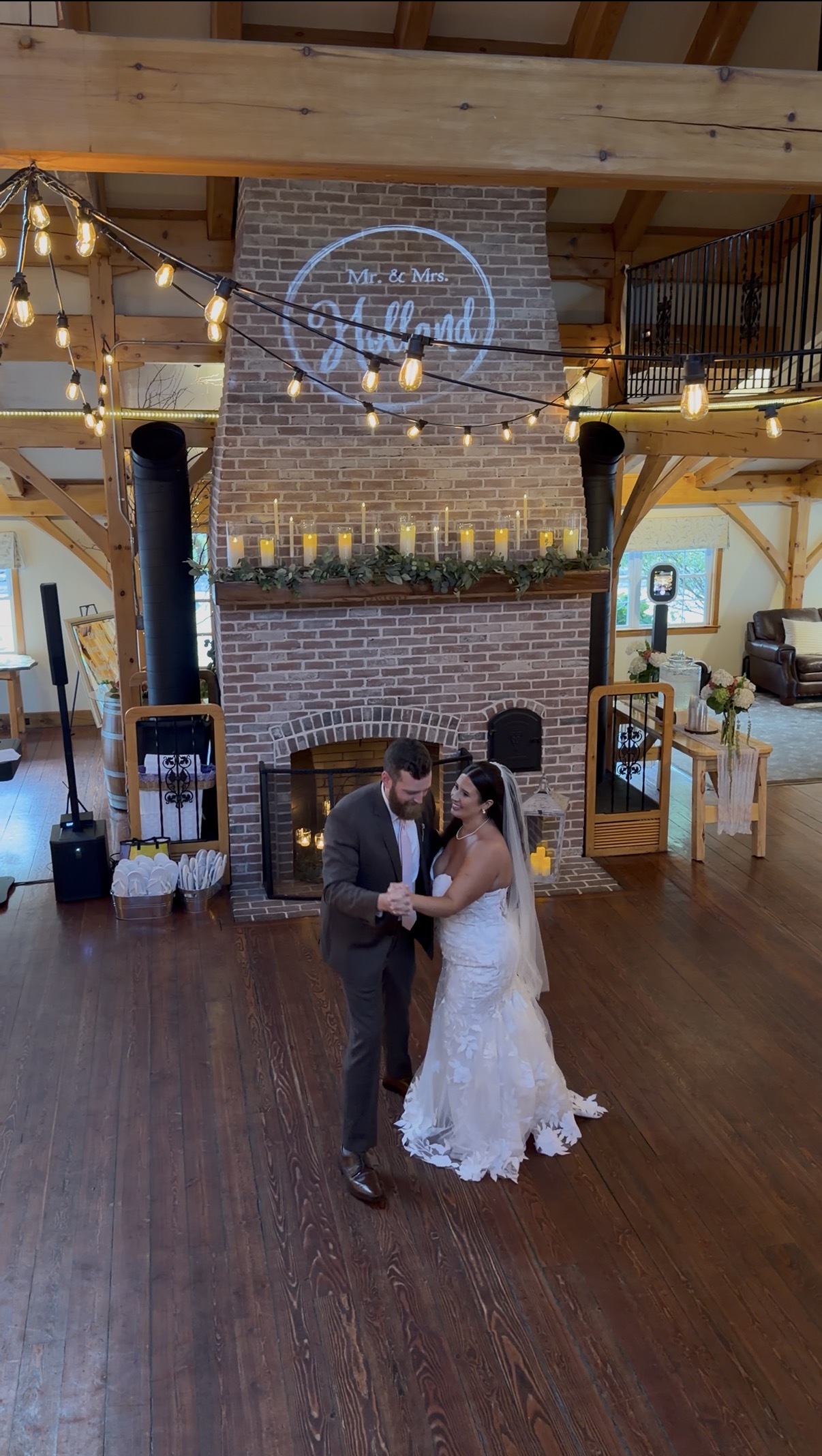 A bride and groom have their first dance.