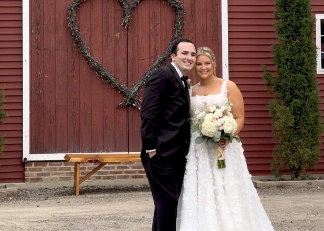 Johanna and Christian at the Zorvino Vineyards red barn during their romantic summer vineyard wedding in Sandown, NH