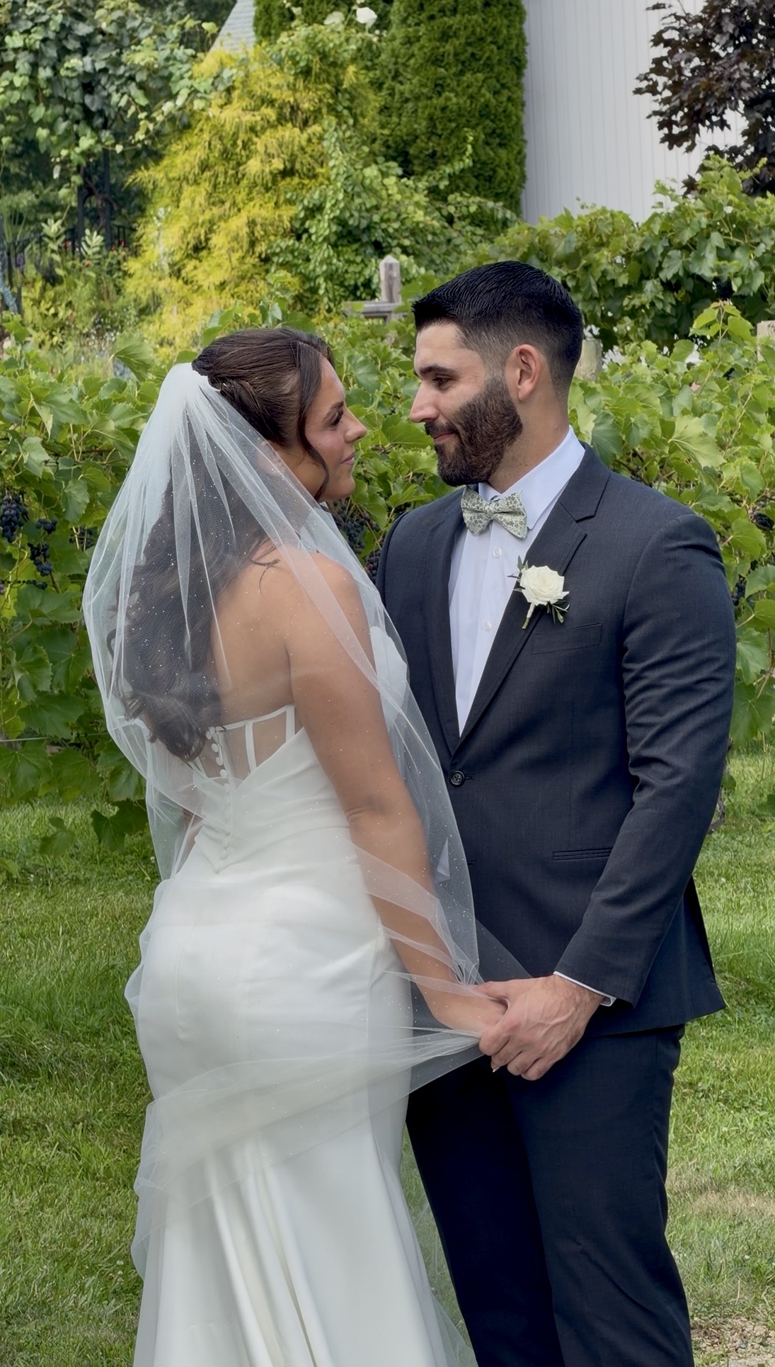 Annie and Jake's first look among the vines — the private vows just moments away
